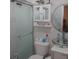 Bright bathroom showcasing a glass shower, toilet, and a modern vanity sink at 1209 Croydonwood Cir, Brandon, FL 33510