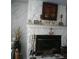 Unique living room fireplace with stone veneer and display mantel at 1209 Croydonwood Cir, Brandon, FL 33510