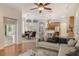 Open-concept living space with dining area and kitchen views at 12113 Whistling Way, Lakewood Ranch, FL 34202