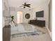 Serene main bedroom featuring a ceiling fan, neutral tones, and ample natural light at 12113 Whistling Way, Lakewood Ranch, FL 34202