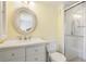 Bright bathroom with modern vanity, fixtures and walk in shower at 1257 S Portofino Dr # 306, Sarasota, FL 34242