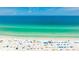 Beautiful beach with white sand, clear turquoise water, and plenty of space for activities at 1257 S Portofino Dr # 306, Sarasota, FL 34242