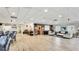 Spacious community room with seating, decor, and natural light, creating a welcoming atmosphere for social gatherings at 1257 S Portofino Dr # 306, Sarasota, FL 34242