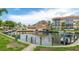 Scenic waterfront view with multiple boat docks, providing convenient access to the open water at 1257 S Portofino Dr # 306, Sarasota, FL 34242