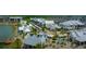 Aerial view of a charming community with shopping, dining, and a beautiful lake at 14312 Crimson Ave, Bradenton, FL 34211