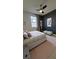 Bedroom with a sleek dark accent wall, creating a modern retreat at 14312 Crimson Ave, Bradenton, FL 34211