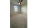 Bedroom with light-colored carpet and a window at 14312 Crimson Ave, Bradenton, FL 34211