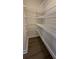 Walk-in closet with wire shelving, providing ample storage space and organization in a modern home at 14312 Crimson Ave, Bradenton, FL 34211