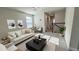 Cozy living room with modern furnishings and lots of natural light at 14312 Crimson Ave, Bradenton, FL 34211