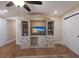 Living room featuring an entertainment center with shelves, drawers, and media storage at 1610 Bayshore Dr, Terra Ceia, FL 34250