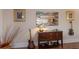 Elegant side console table in living room with guitar and artistic decor at 1610 Bayshore Dr, Terra Ceia, FL 34250