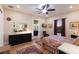 Stylish bedroom featuring a dresser, en-suite bathroom, and a scenic window view at 1610 Bayshore Dr, Terra Ceia, FL 34250