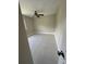 This bedroom features neutral walls and tile flooring at 185 Wood Dove Ave, Tarpon Springs, FL 34689