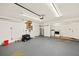 The garage features ample space, laundry area, and potential for storage at 19897 Midway Blvd, Port Charlotte, FL 33948