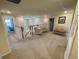 Open second story hallway with carpet, neutral colors and access to bedrooms and living spaces at 20940 Valore Ct, Venice, FL 34293
