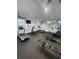Well-equipped community fitness center with treadmills, ellipticals, and weights, promoting a healthy lifestyle at 2200 E Village Ct, Venice, FL 34293