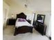 Main bedroom featuring decorative furnishings, ceiling fan, and natural lighting at 2200 E Village Ct, Venice, FL 34293