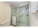 Bathroom featuring a shower with sliding glass doors at 2237 Circlewood Dr # 18, Sarasota, FL 34231