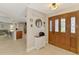 A cozy foyer that leads to a spacious living area at 227 Monet Dr, Nokomis, FL 34275