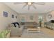 Cozy living room with neutral paint, recessed lighting, large sectional, and large windows at 227 Monet Dr, Nokomis, FL 34275
