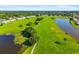 Beautiful aerial view showcasing the community's green spaces, ponds, and walking trails at 2411 New Haven Cir # 70, Sun City Center, FL 33573