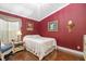 Charming bedroom with hardwood flooring, natural lighting, and tastefully coordinated decor at 2411 New Haven Cir # 70, Sun City Center, FL 33573