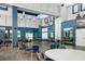 Large, well-lit community center space with ample seating, perfect for social gatherings at 2411 New Haven Cir # 70, Sun City Center, FL 33573