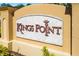Kings Point community sign in neutral colors, surrounded by manicured landscaping at 2411 New Haven Cir # 70, Sun City Center, FL 33573