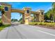 Attractive community entrance gate providing security and a sense of arrival at 2411 New Haven Cir # 70, Sun City Center, FL 33573
