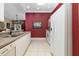 Spacious kitchen boasts granite counters, white cabinets, and modern appliances at 2411 New Haven Cir # 70, Sun City Center, FL 33573