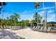 Lounge chairs line the outdoor pool deck, providing a relaxing space to soak up the sun and enjoy the beautiful weather at 2411 New Haven Cir # 70, Sun City Center, FL 33573