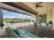 This patio offers a lounge area with furniture and a view of the pool at 25143 Spartina Dr, Venice, FL 34293