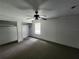 Bedroom featuring neutral paint, closet for storage, standard ceiling fan, and natural light at 27 Tucker Ave, Sarasota, FL 34232