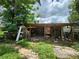 View of outbuilding and some hardscaping at 27 Tucker Ave, Sarasota, FL 34232