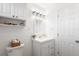 Clean bathroom with white cabinets, modern lighting, and stylish decor at 2802 21St W St, Bradenton, FL 34205