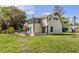 Property with a uniquely styled home and spacious yard, perfect for outdoor activities and future landscaping at 305 Chauncey Ave, Bradenton, FL 34208