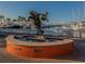Waterfront harbor featuring an ornate manatee sculpture near docking yachts and clear blue skies at 305 Chauncey Ave, Bradenton, FL 34208