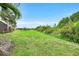 Expansive backyard with pond view at 3379 Chestertown Loop, Bradenton, FL 34211