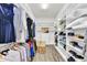 Spacious walk-in closet with custom shelving, providing abundant storage space for clothes and accessories at 3379 Chestertown Loop, Bradenton, FL 34211
