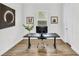 Home office featuring modern desk, rolling chair, and artwork on the wall at 3379 Chestertown Loop, Bradenton, FL 34211