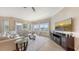 Bright living room with plush seating, a large windows and a view to the outside at 3430 77Th W St # 301, Bradenton, FL 34209