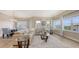 Spacious living area showcasing a large sectional sofa, open floor plan, and natural light at 3430 77Th W St # 301, Bradenton, FL 34209