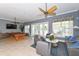 Cozy lounge area featuring a pool table, comfortable seating, and a view of the pool area at 3430 77Th W St # 301, Bradenton, FL 34209