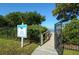 Private Resident Sunset Deck is fenced and leads to water access for community residents at 3430 77Th W St # 301, Bradenton, FL 34209