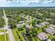 This home boasts a well-kept roof, landscaping, pond, and private driveway situated in a lush and vibrant neighborhood at 3530 Wilkinson Woods Dr # 14, Sarasota, FL 34231
