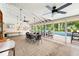 Relax in the open clubhouse with views of the community pool and lots of open space for group activities at 3530 Wilkinson Woods Dr # 14, Sarasota, FL 34231