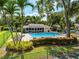Enjoy the community pool with beautiful landscaping, a clubhouse and a tranquil environment for relaxation and recreation at 3530 Wilkinson Woods Dr # 14, Sarasota, FL 34231