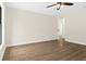 Spacious bedroom featuring neutral walls, wood-look flooring and closet at 3551 65Th Avenue E Cir, Sarasota, FL 34243