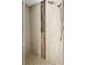 Updated shower stall featuring neutral tile work, a mosaic tile floor, and dual shower heads at 3551 65Th Avenue E Cir, Sarasota, FL 34243