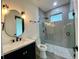 Modern bathroom with a walk-in shower, stylish vanity, and contemporary fixtures at 3616 Bellefonte Ave, North Port, FL 34286
